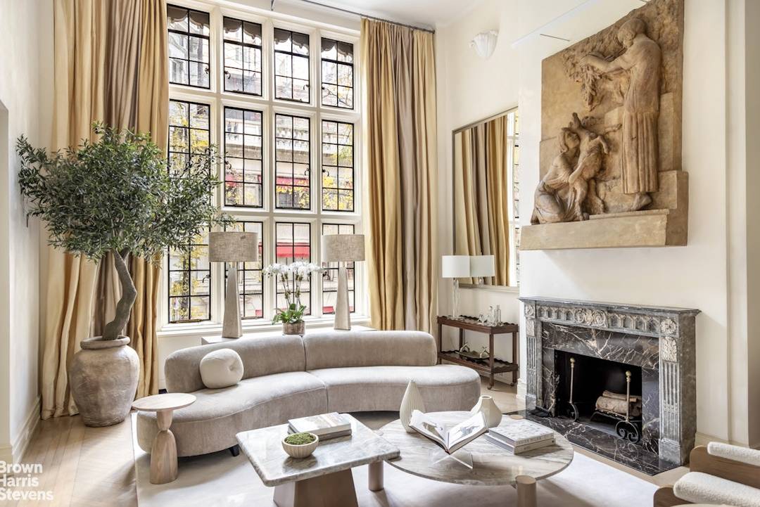 Chic Duplex with Dramatic Double Height Living Room Perfectly located on one of the Upper East Side's most charming blocks, this glamorous classic six room duplex at 14 East 75th ...