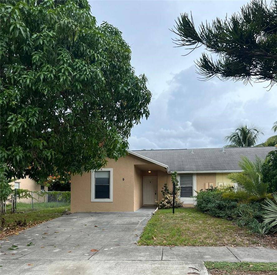 Spacious 4 bedroom, 2 bath half duplex located in desirable Deerfield Beach.