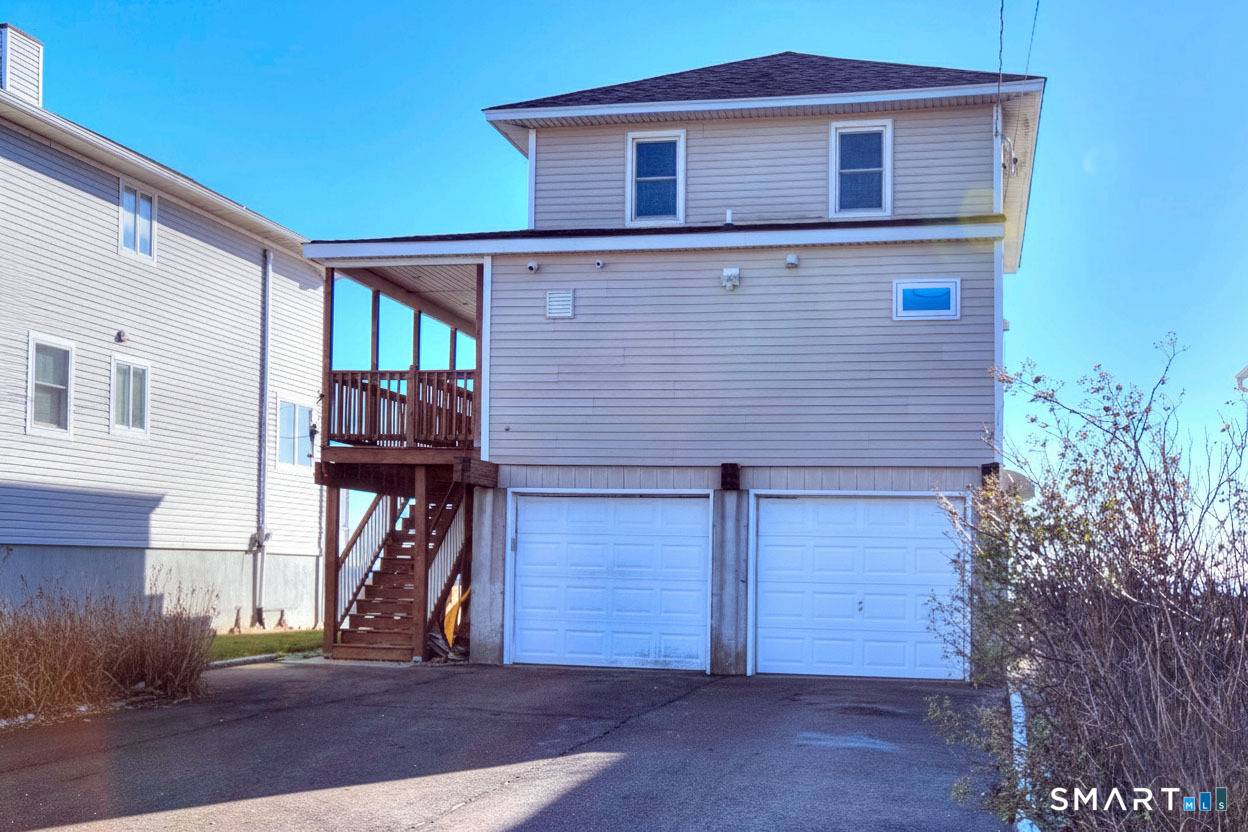 51 Point Beach Drive is a true direct waterfront residence, right on the Long Island Sound.