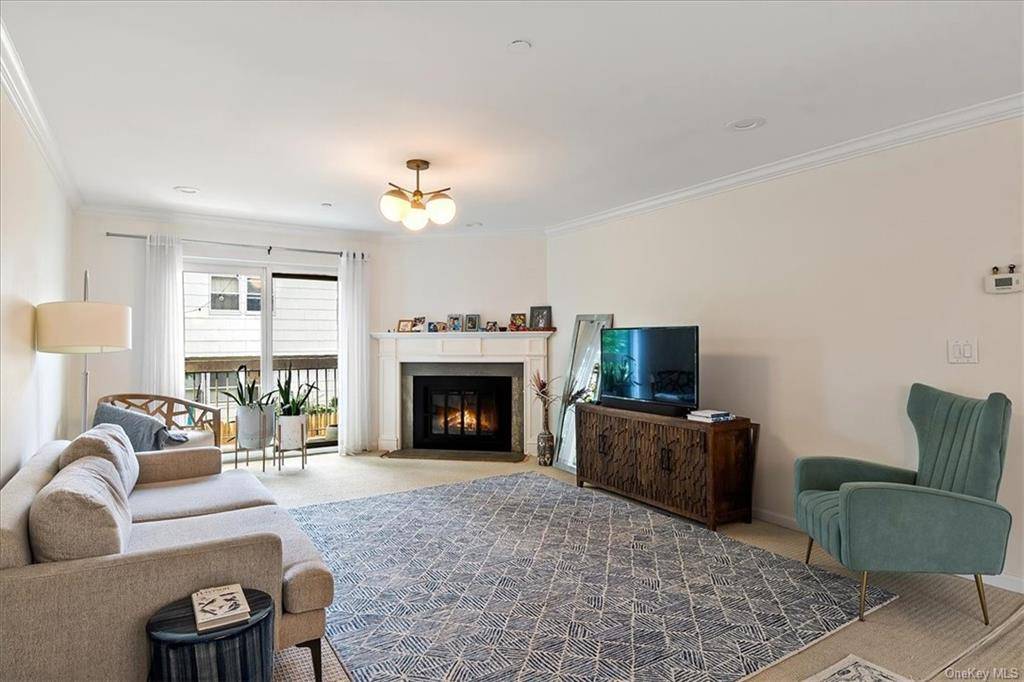Beautifully updated duplex Town House condo that offers a perfect blend of modern convenience and comfortable living.