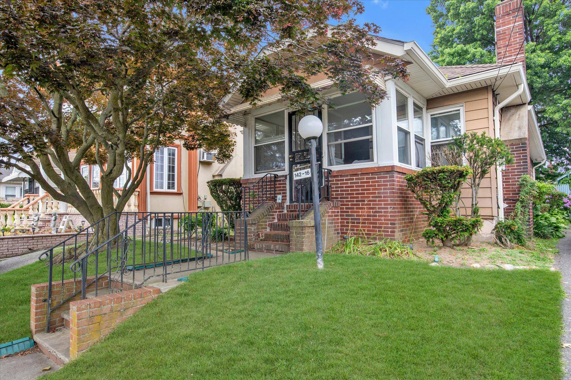 Sunny Detached Bungalow Ranch on a Great Block in the Heart of Laurelton.
