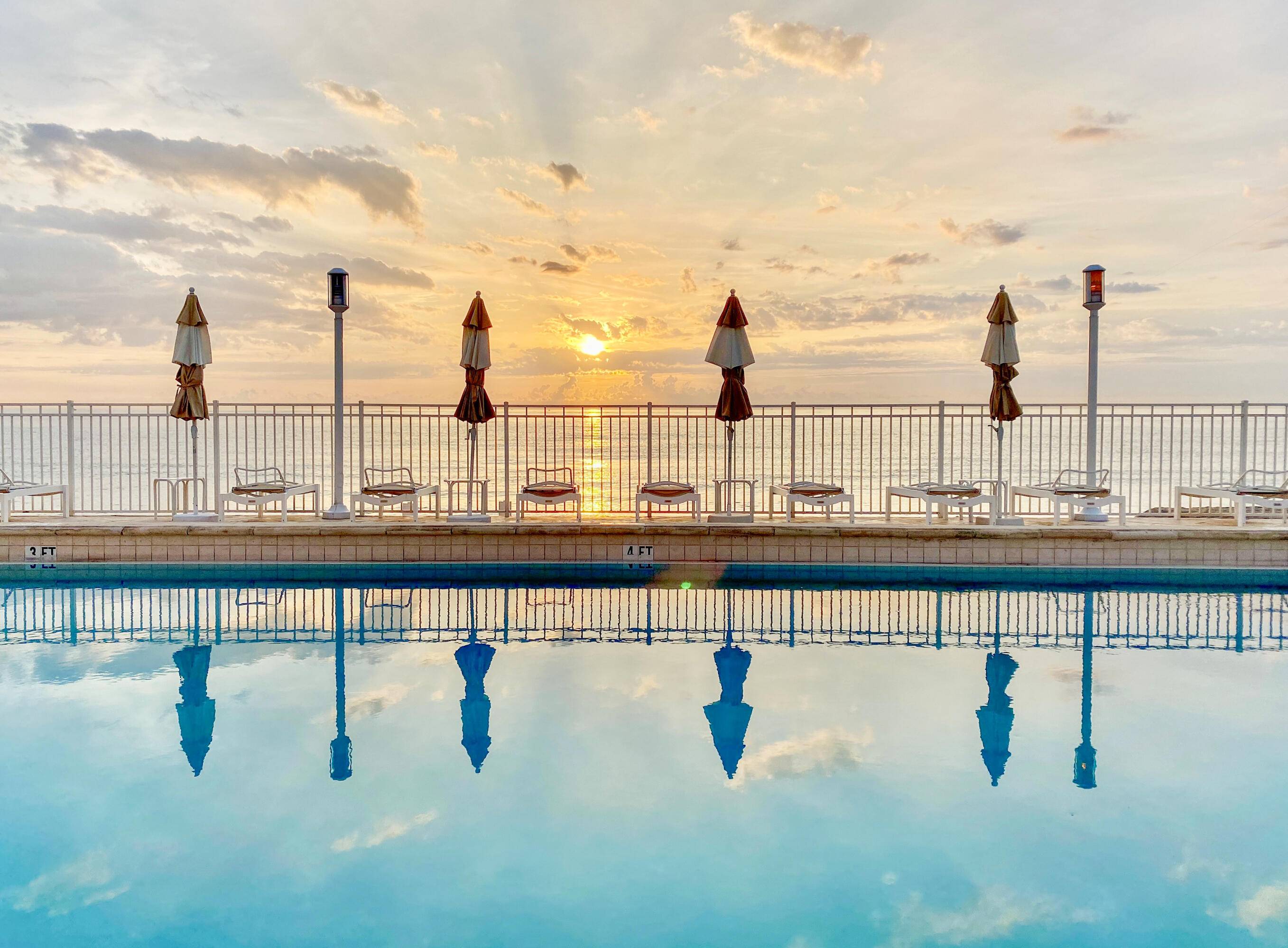 Experience the ultimate beachfront lifestyle in this boutique style condo featuring floor to ceiling hurricane impact windows and a south facing private balcony with breathtaking ocean and city views.