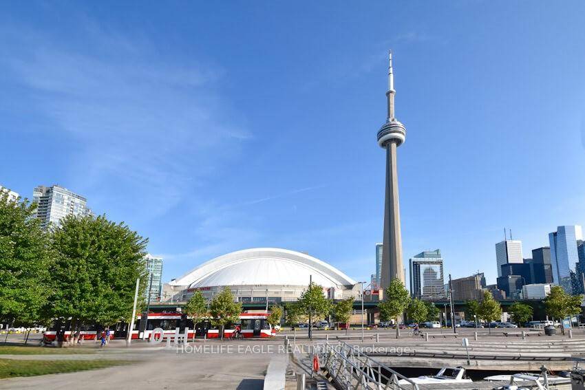 This fully furnished, exceptionally spacious 24th floor corner suite with a balcony offers sweeping views of the skyline, including the iconic CN Tower and SkyDome.