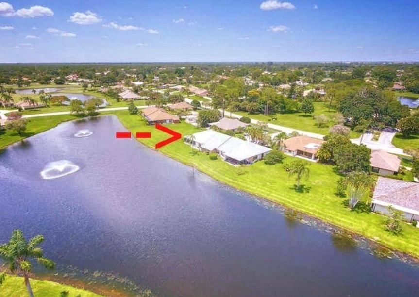 This beautifully remodeled 3 2 1 villa offers serene lake fountain views from your spacious screened porch complete w pull down shutters for comfort privacy.