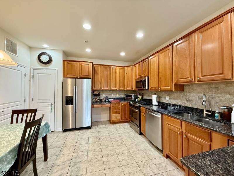 Gorgeous 2 Bedroom, 2 bath, 1st floor condo in a beautiful 55 gated community with 24 hour security.