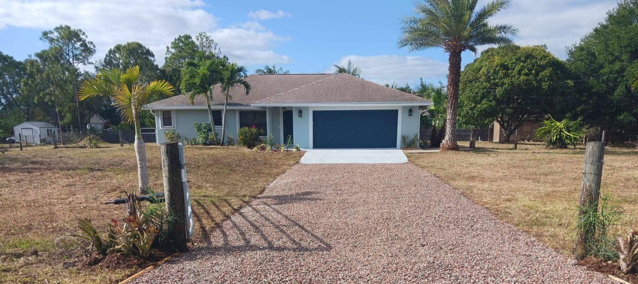 Welcome to your slice of paradise in the highly sought after community of Loxahatchee !