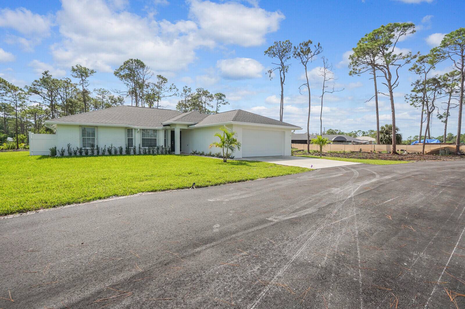 Beautifully remodeled pool home with 3 bedrooms 3 bathrooms and den.