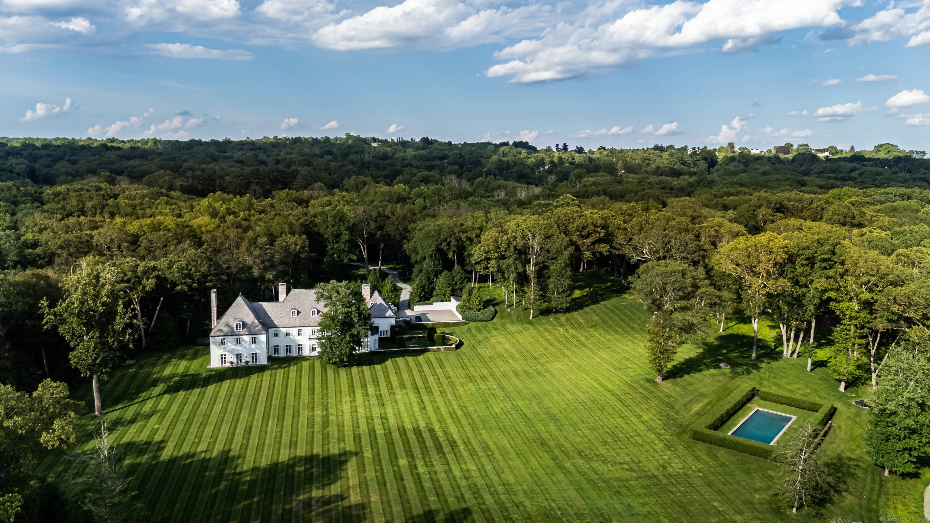 Clark House, a legacy property with extraordinary provenance, was re imagined by design legends Delphine and Reed Krakoff, adding their imprimatur of spare modern elegance.