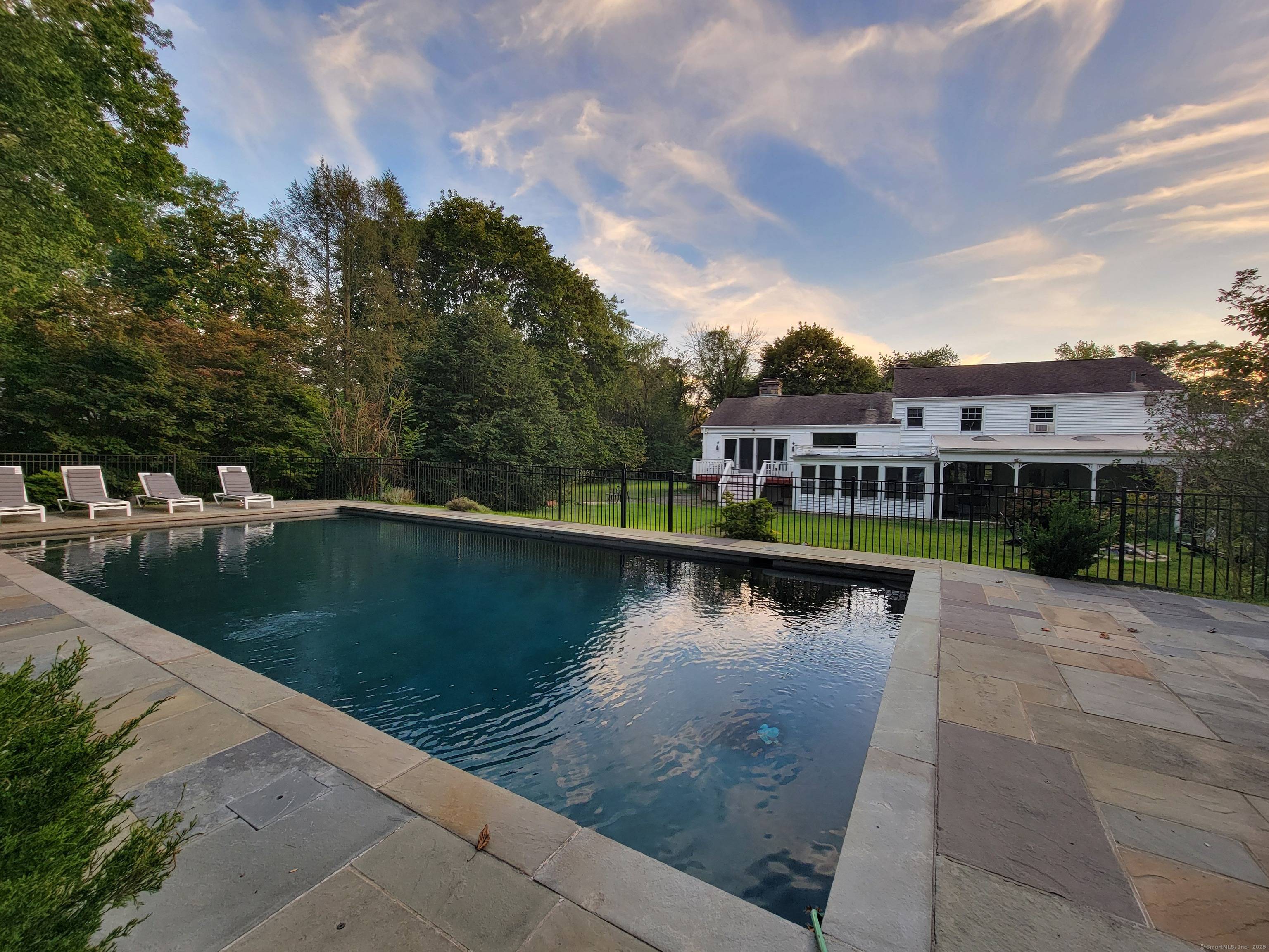 Sprawling 2. 08ac. Estate with matured trees.