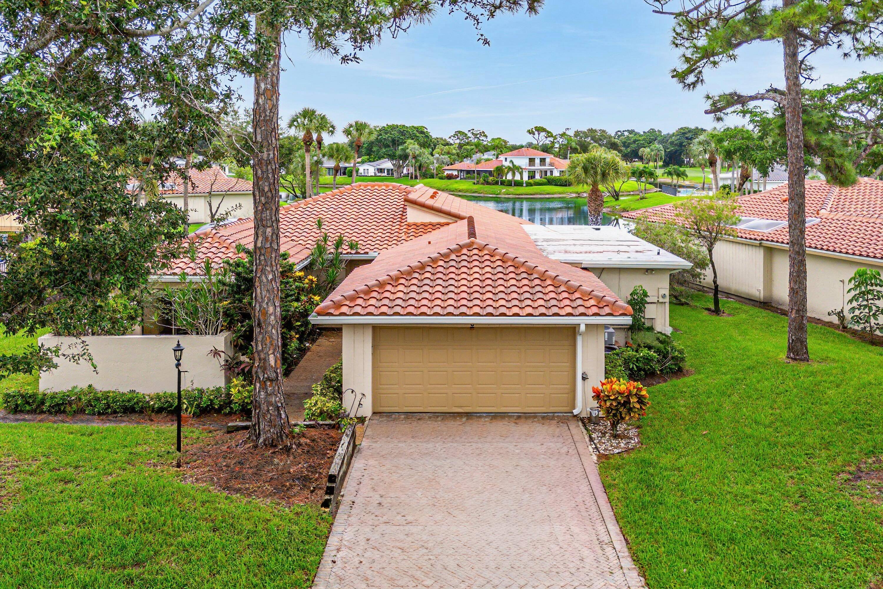 This premium water view residence offers 2, 660 sq ft of living space and is steps away from the community pool.
