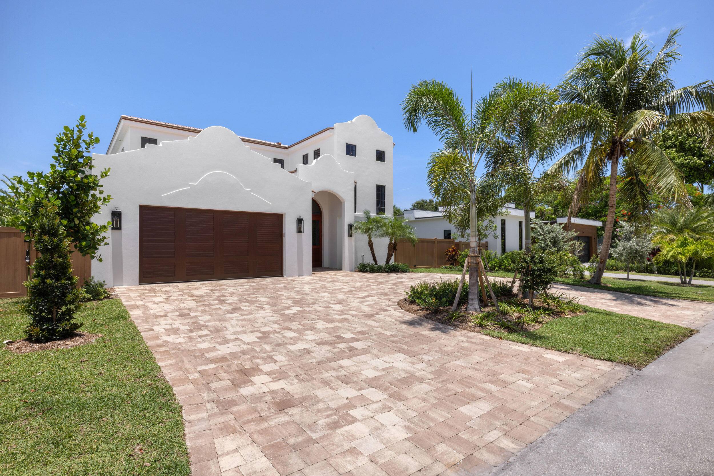 Welcome to 309 Cascade Lane the only brand new construction home in all of Palm Beach Shores.