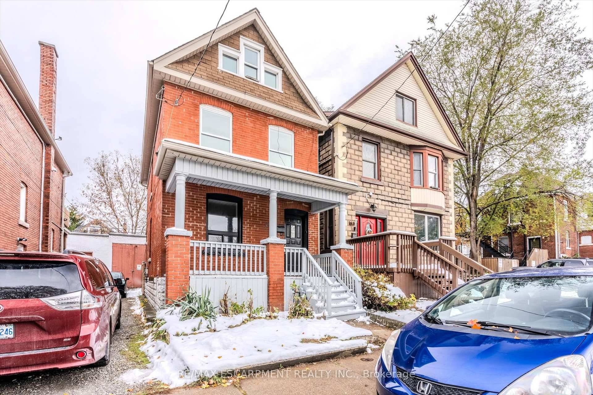 Charming 2. 5 Storey Solid Brick Home in Central Hamilton !