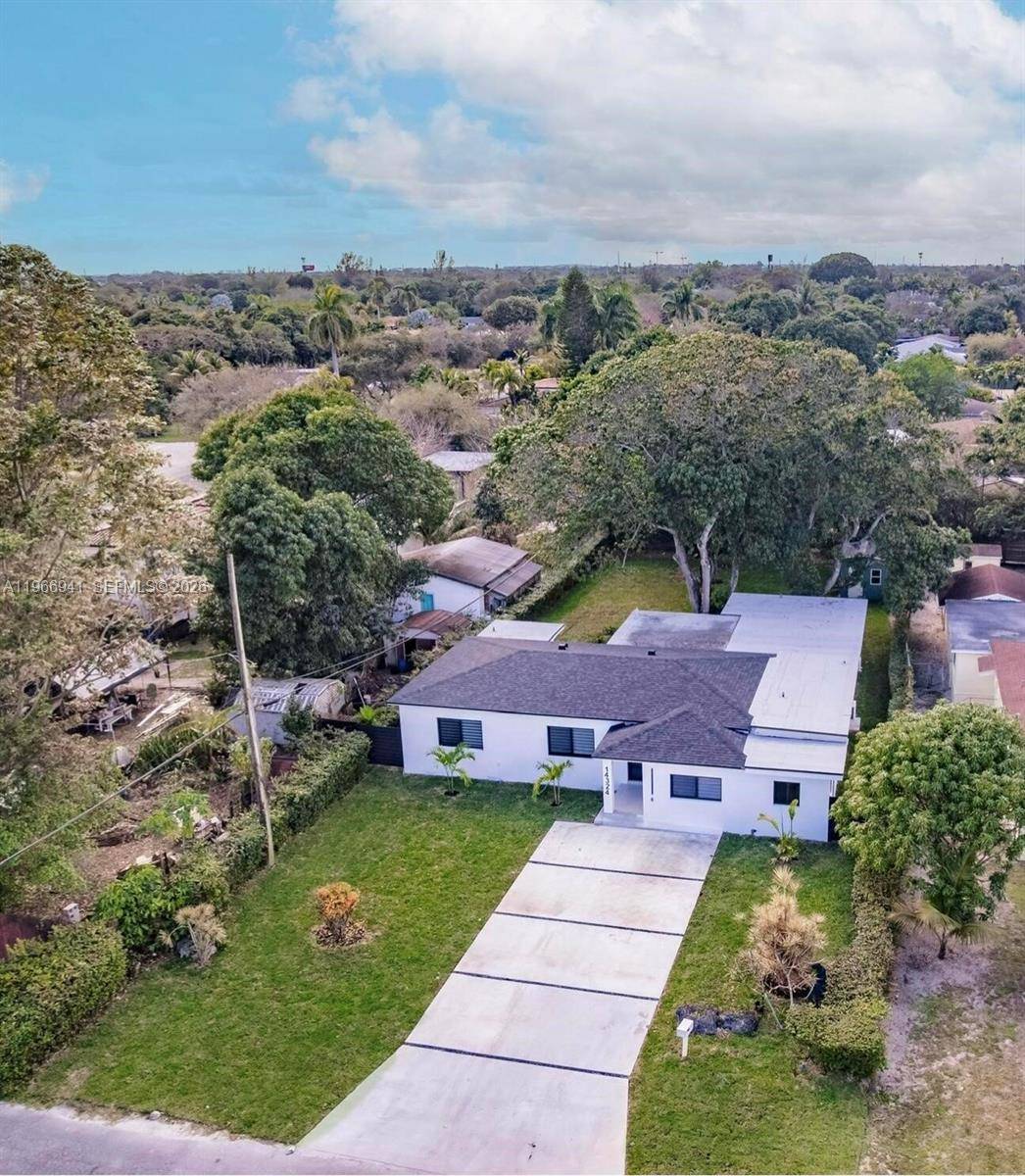 Completely renovated and move in ready, this exceptional 5 bedroom, 3 bathroom home sits on a rare 0.