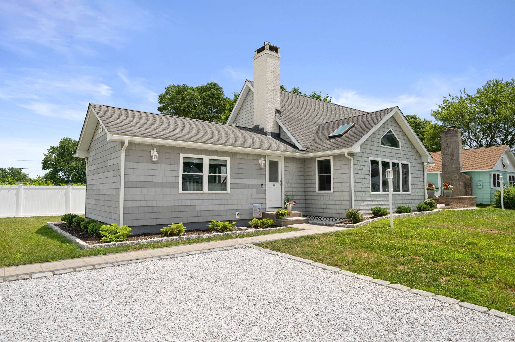 This completely remodeled updated contemporary craftsman ranch style home is located just steps to the private association beach with LI Sound views from the property !