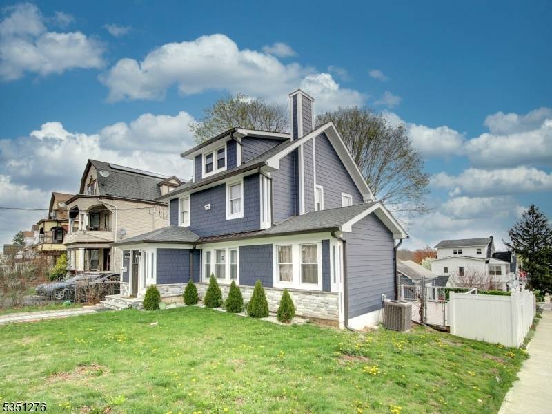 Welcome to this beautifully renovated single family home nestled on an oversized corner lot in the highly sought after Upper Irvington area.