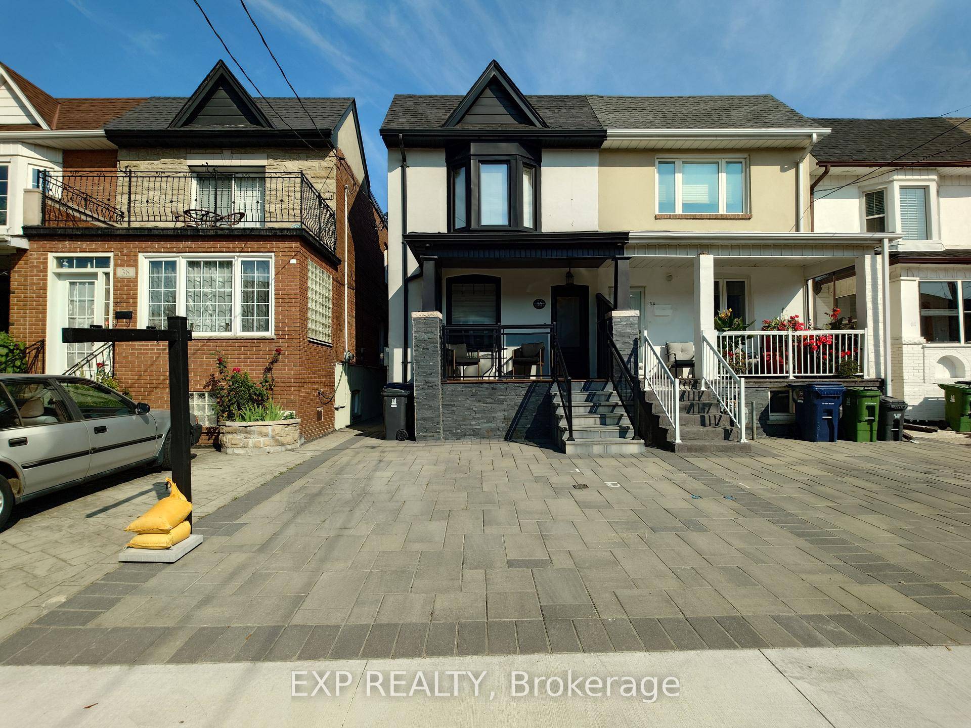 Executive semi detached with a fully paved back yard, deck amp ; cedar stained fencing.