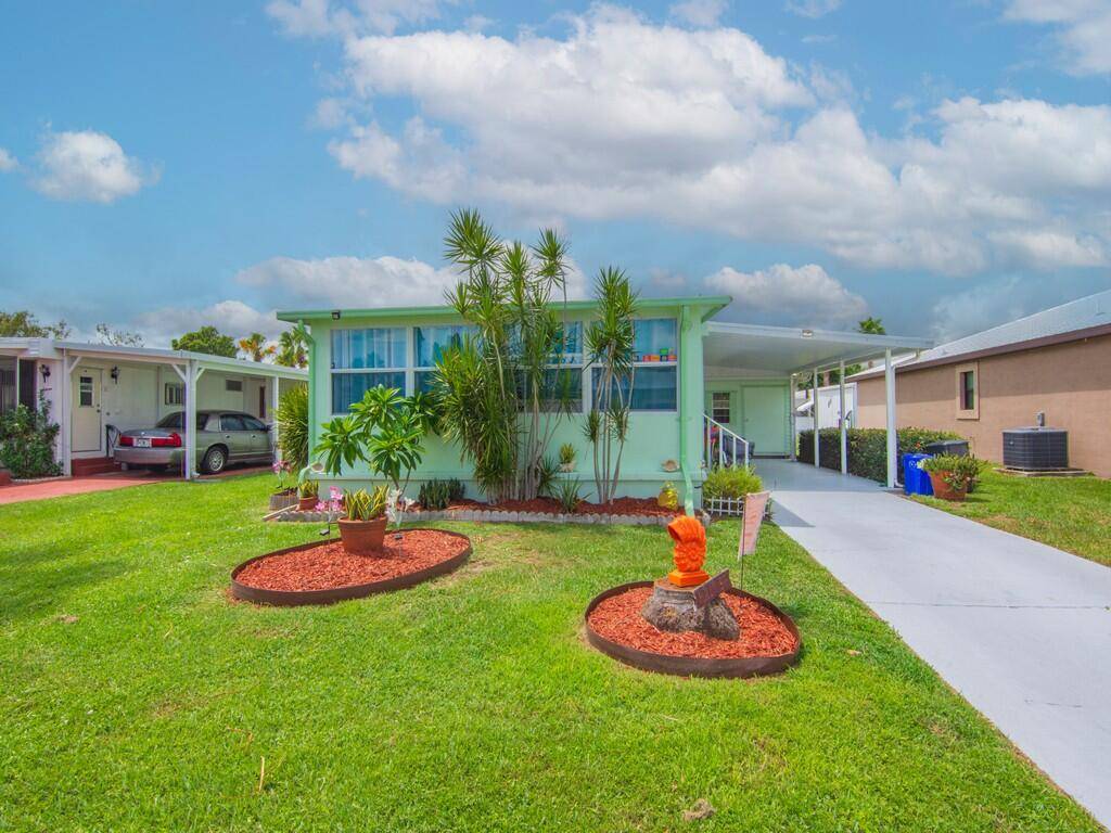 MOTIVATED SELLER for this charming 2 2 manufactured home nestled in the heart of the sought after 55 community of Spanish Lakes One.