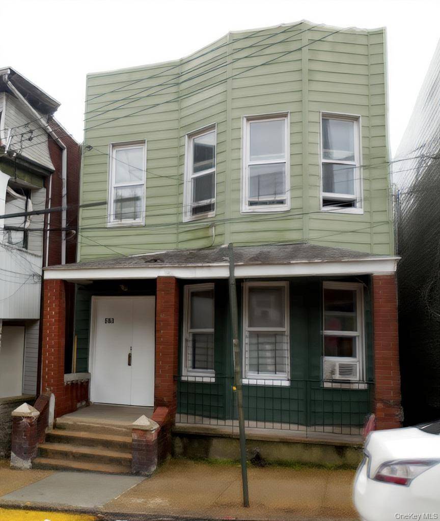 Occupied 2 family house in the Norwood section of the Bronx.