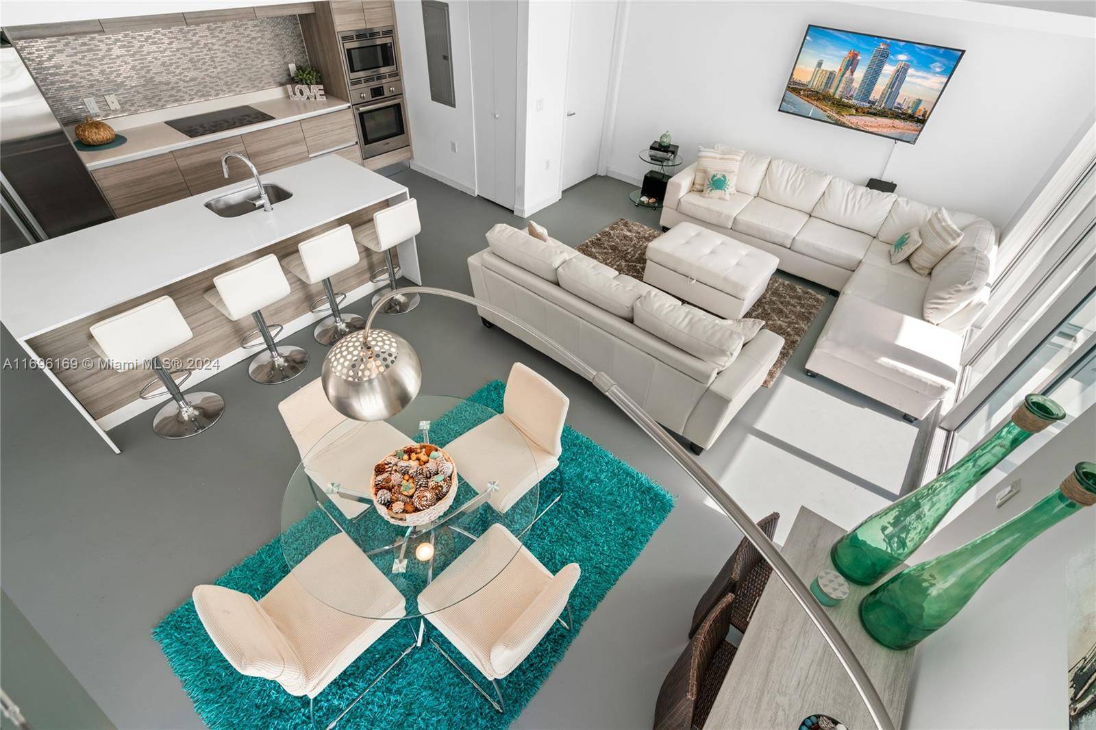 Rare two story apartment in Peloro, a boutique building in Miami Beach, just one block from the beach !