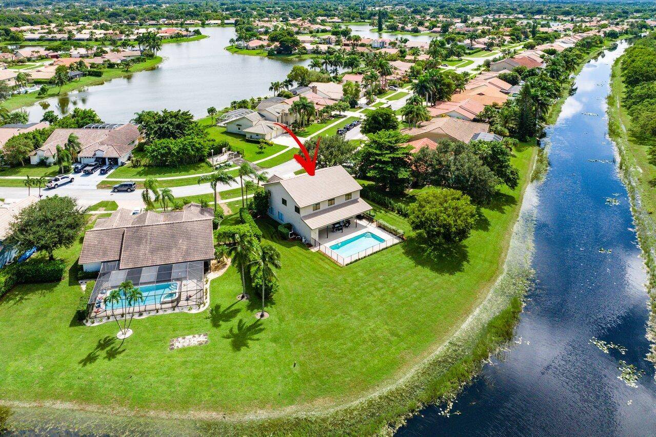 Welcome to one of THE BEST waterfront AND preserve view lots in all of West Boca !