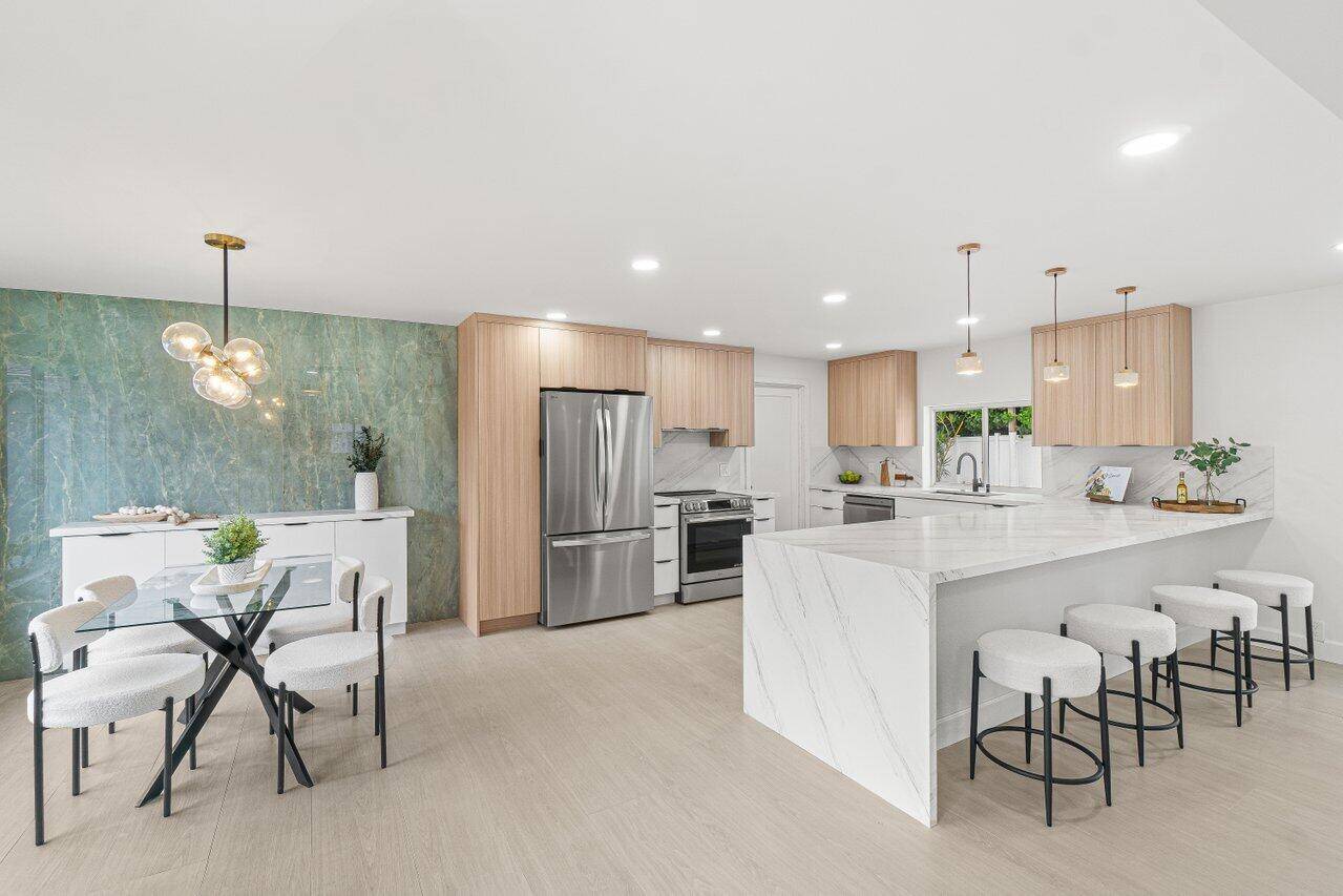 STEP INTO LUXURY LIVING AT IT'S FINEST IN THIS COMPLETELY REMODELED 4 BEDROOM, 4 FULL BATH HOME w STUNNING DESIGNER FINISHES RIGHT OFF HGTV !