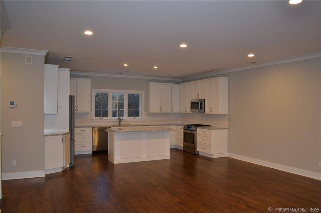 Nantucket Style 2016 built Townhome with modern day amenities and convenience to shopping including Whole Foods, beaches, restaurants and Metro North Train.