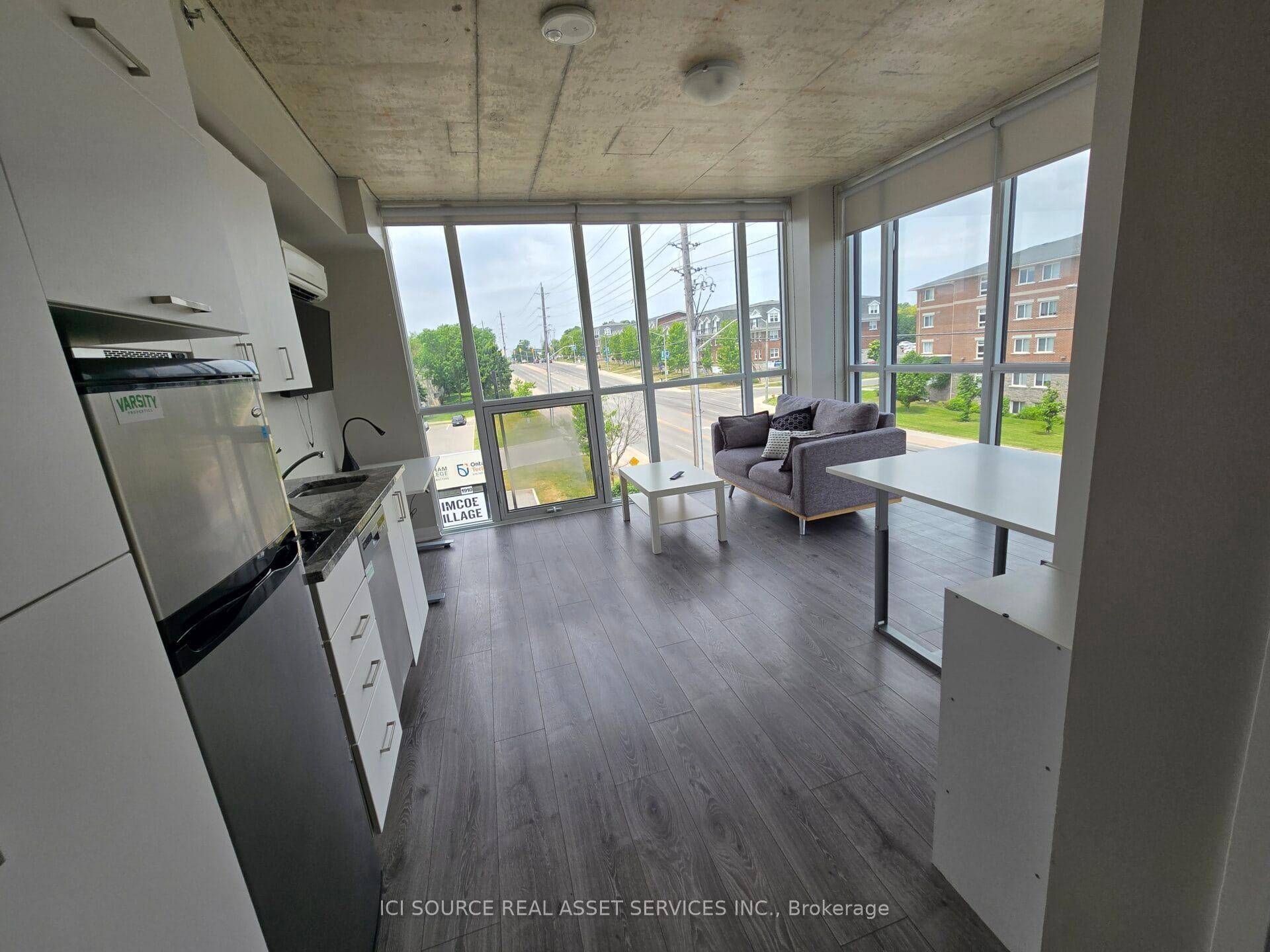 Rare corner unit, larger floorplan, floor to ceiling windows, studio apartment with ensuite, laundry, high ceilings, loads of storage !