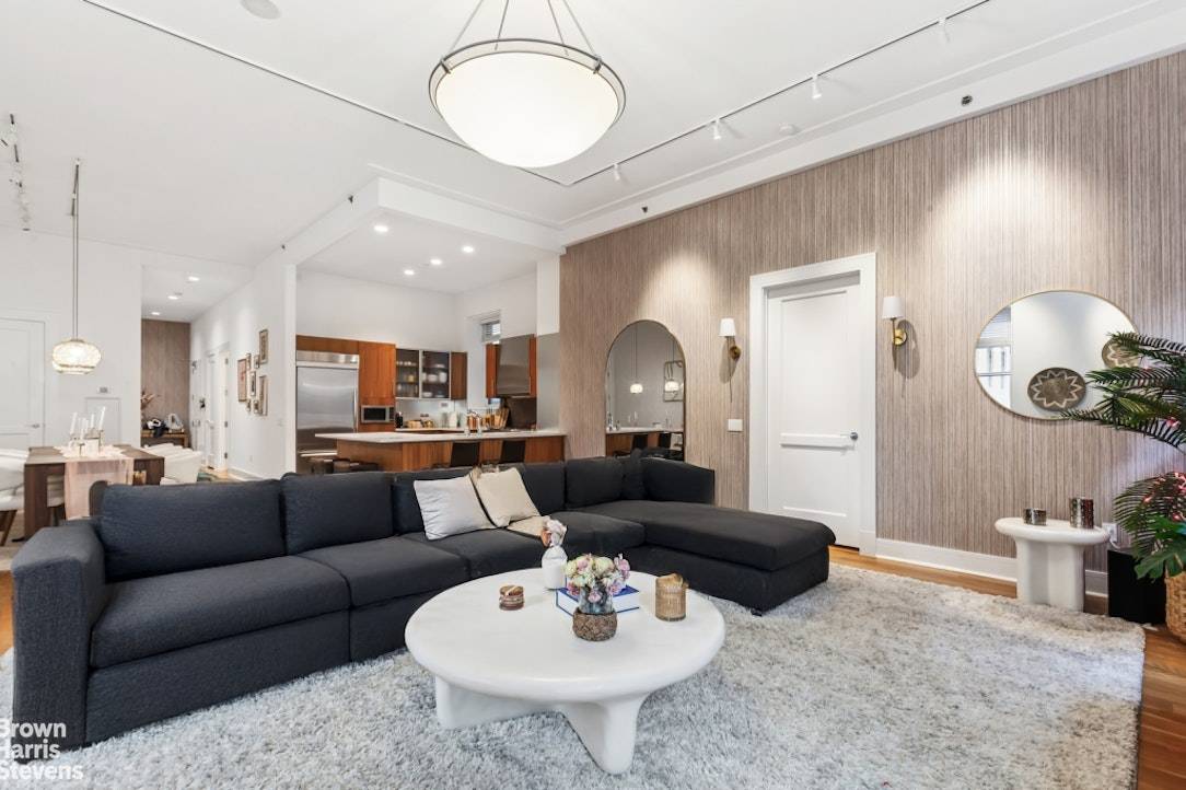 Welcome to Residence 4A at 426 West 58th Street, a spacious two bedroom, two bathroom home with approximately 1, 800 square feet with loft like features.