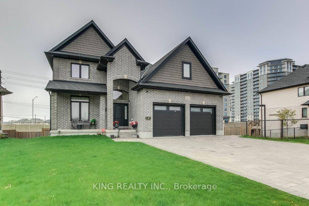 This spacious and well kept home is perfect for large families or home based businesses, offering 4 bedrooms upstairs, 2 additional bedrooms in the walk out basement, and 4.