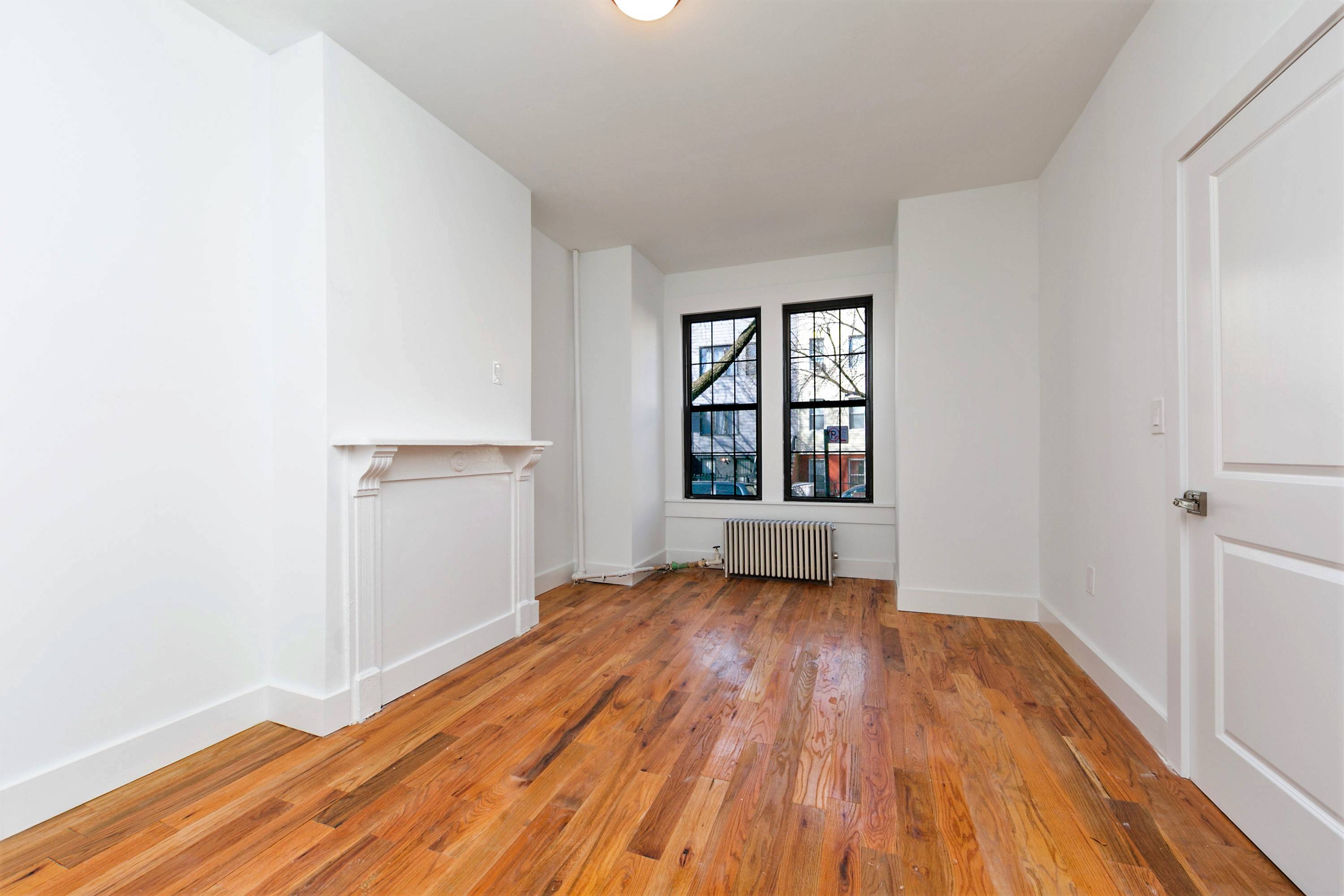 This two family house is located on a quiet tree lined block.
