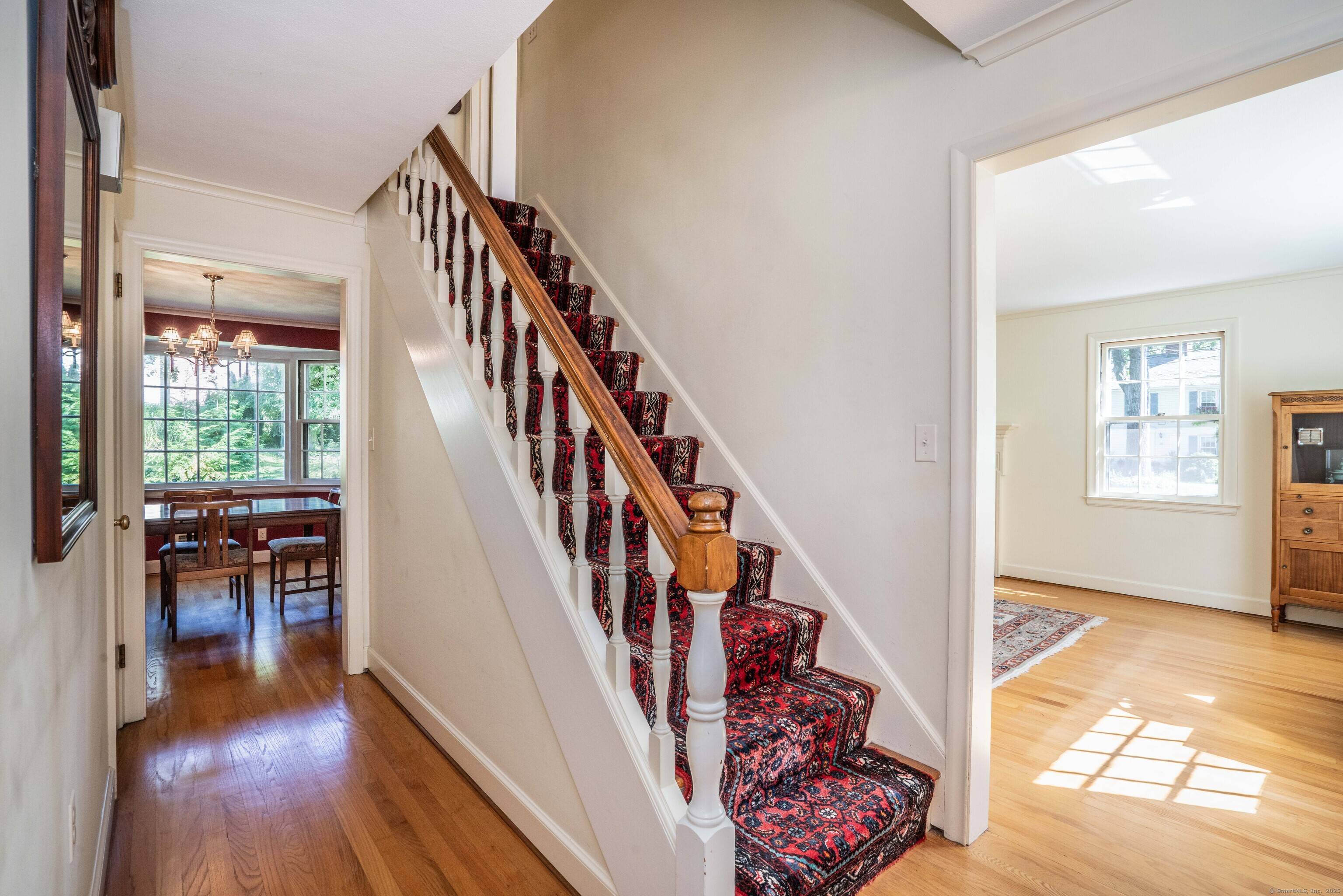Welcome to 64 Harvest Lane, a charming Colonial on a quiet street in the highly desirable Bugbee School District.