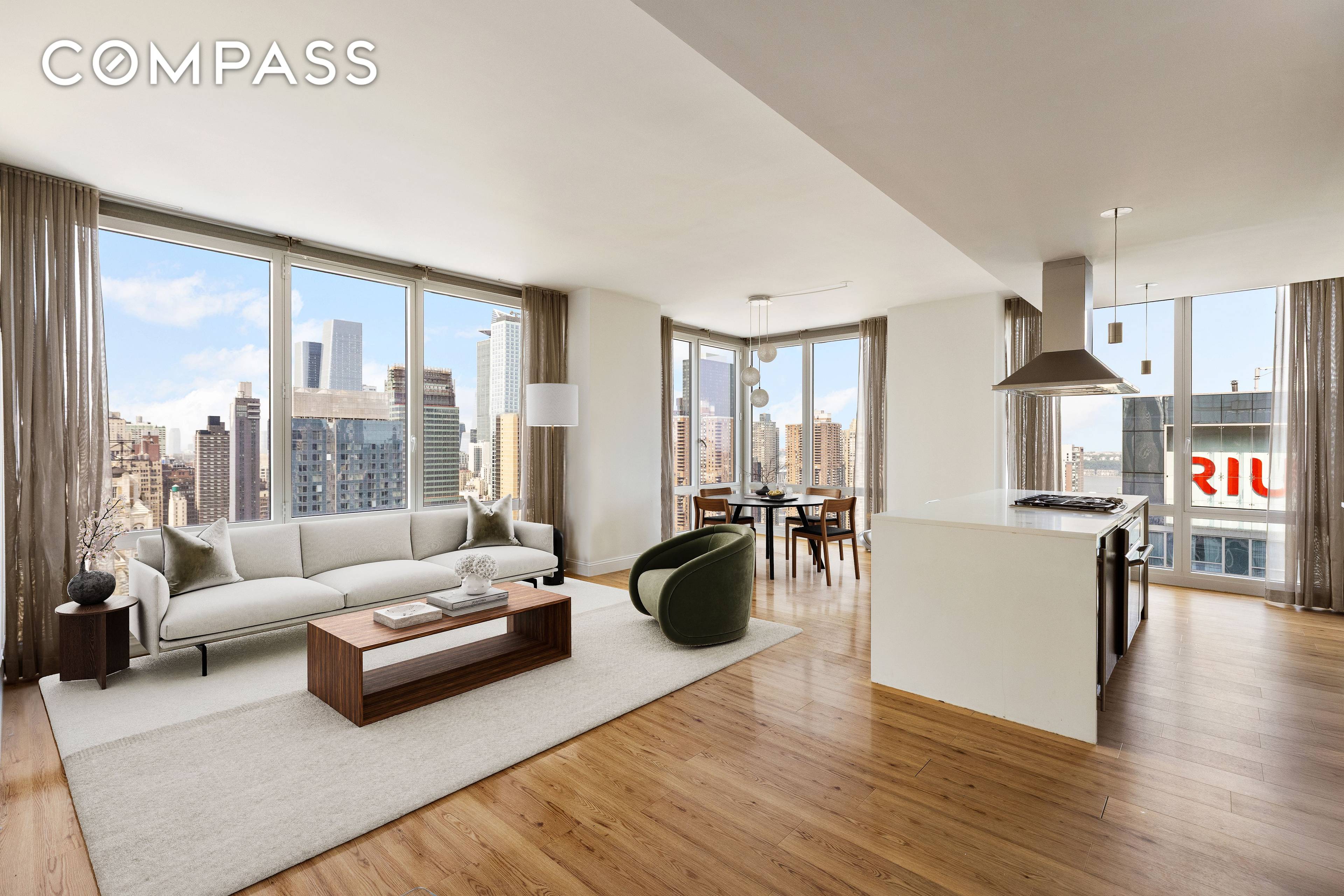 Perched on a high floor at The Platinum, Residence 3103 is a thoughtfully designed two bedroom, two and a half bath corner apartment with expansive southern and western exposures.