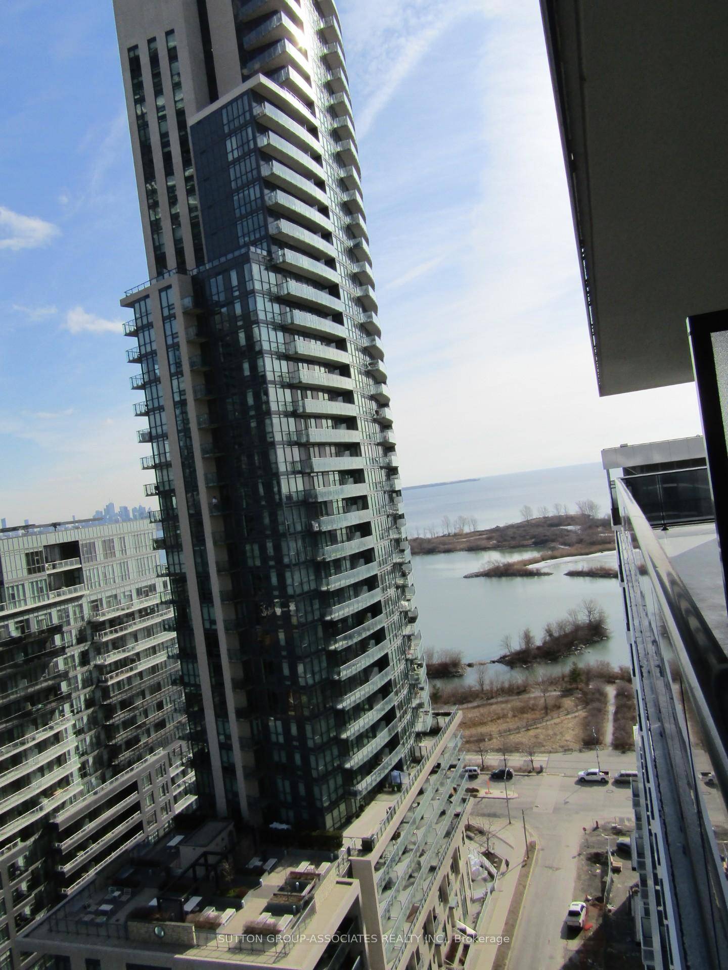 This Beautiful 1 Bedroom Den unit Features a modern kitchen with quartz countertops, stainless steel appliances, and floor to ceiling windows that flood the space with natural light.