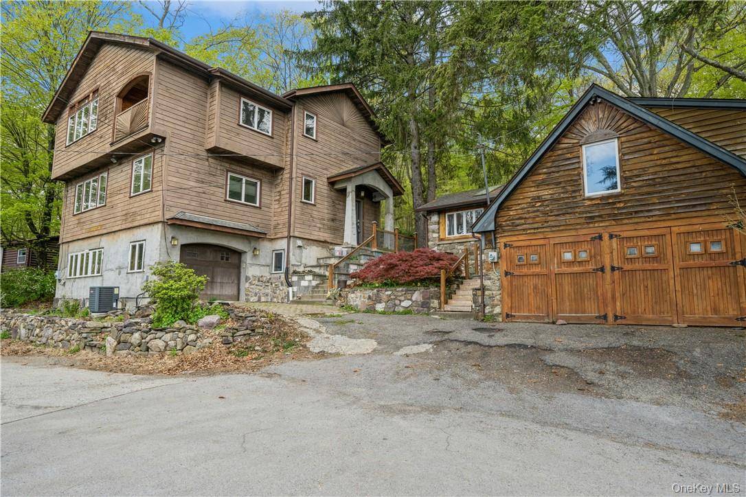 Two fabulous homes on a scenic lot surrounded by nature w WATER VIEWS of Greenwood Lake.