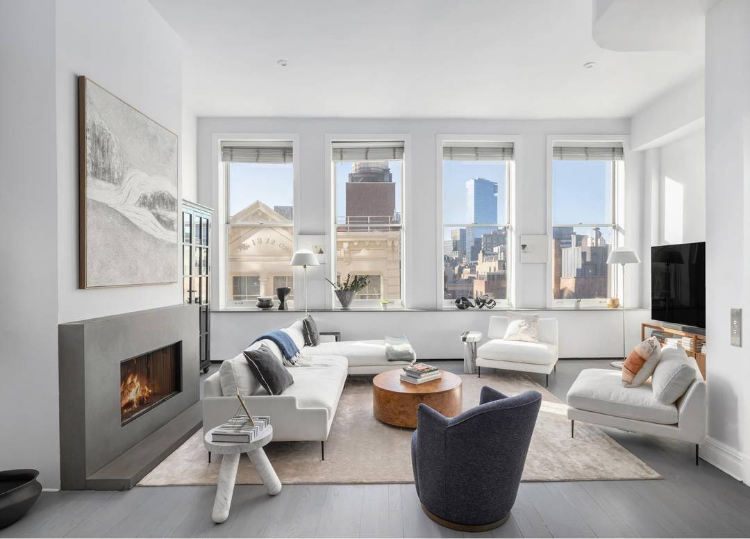 The Eklund Gomes Team presents this rare Prewar High Floor 3 bed 3 bath Loft Condo in Soho.