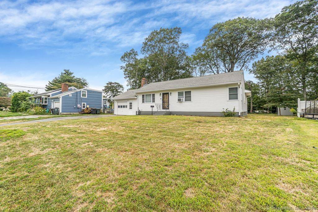 Welcome to this beautifully remodeled ranch style home, featuring an open floor layout that seamlessly connects the living, dining, and custom built kitchen areas.