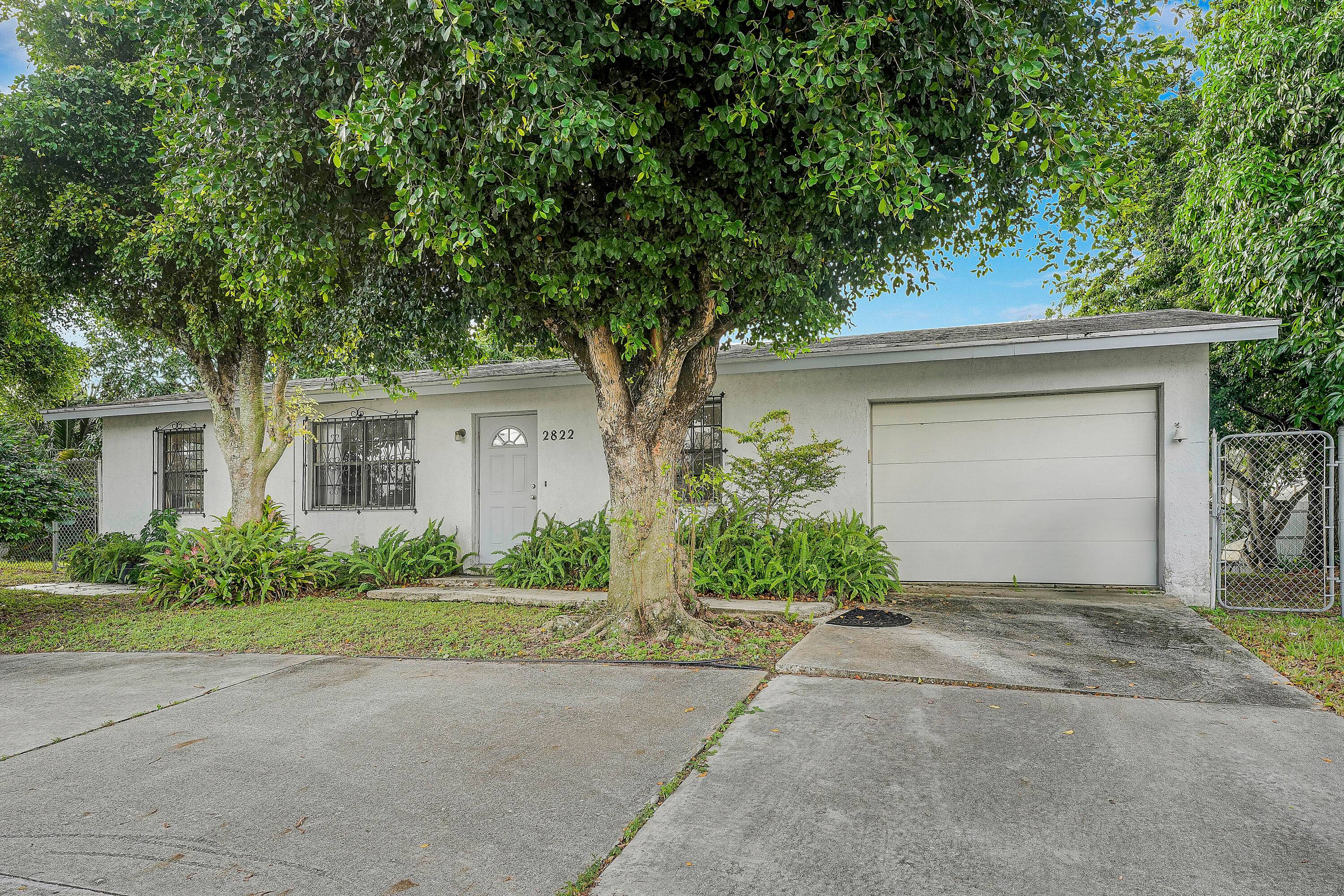 Solid CBS Single Family House conveniently located near schools, highway and Palm Beach International Airport.