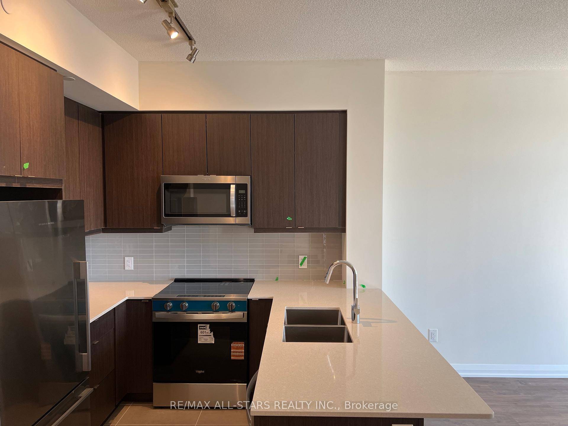 Brand new condo by Pinnacle Group, facing south west with open balcony, 9 feet ceiling.