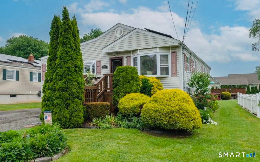 Located in the highly sought after Woodmont neighborhood, this amazing property is ideally situated on over half of an acre of beautiful, fully usable land.