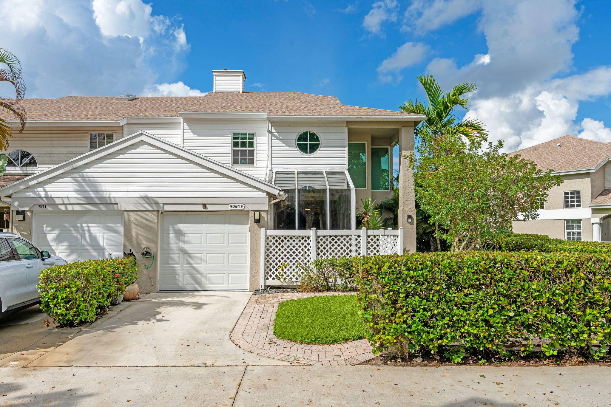 Rarely available corner 8209 ; unit townhouse in the highly desirable Boca Gardens community with lakefront views.