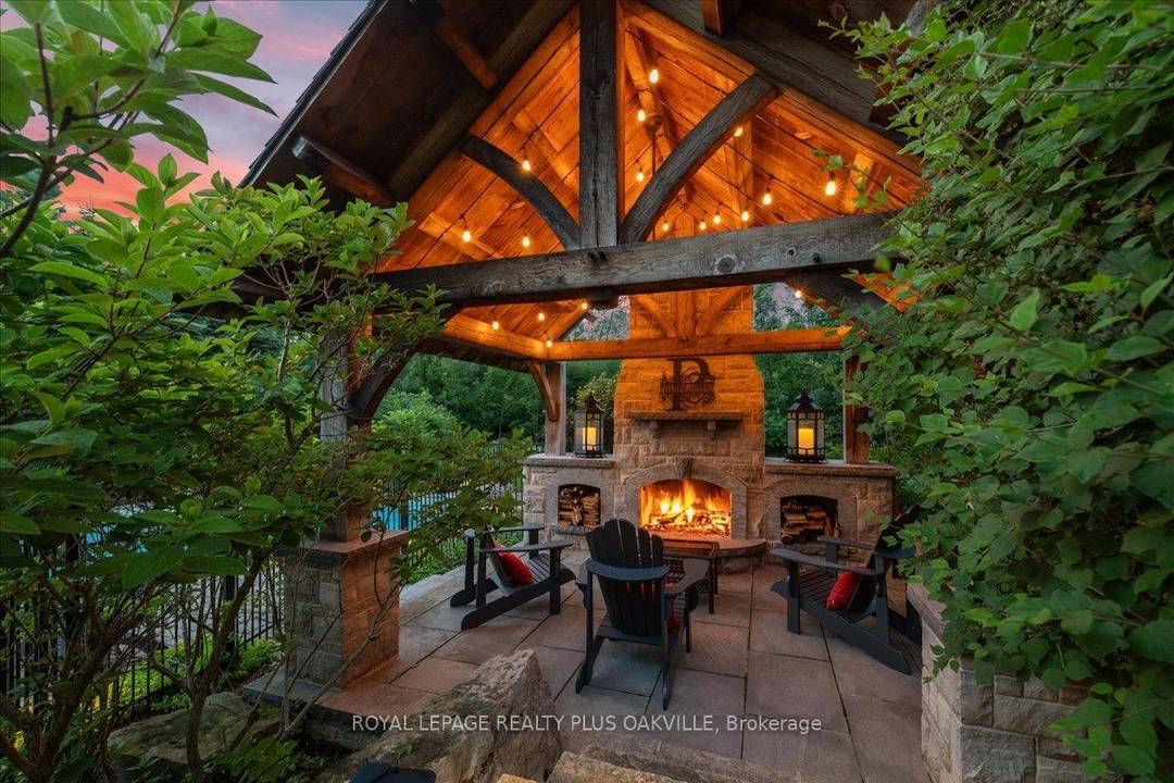 Beautifully designed executive home offering over 5, 700 sq ft of finished living space on a quiet court, with exceptional privacy and stunning treed views.