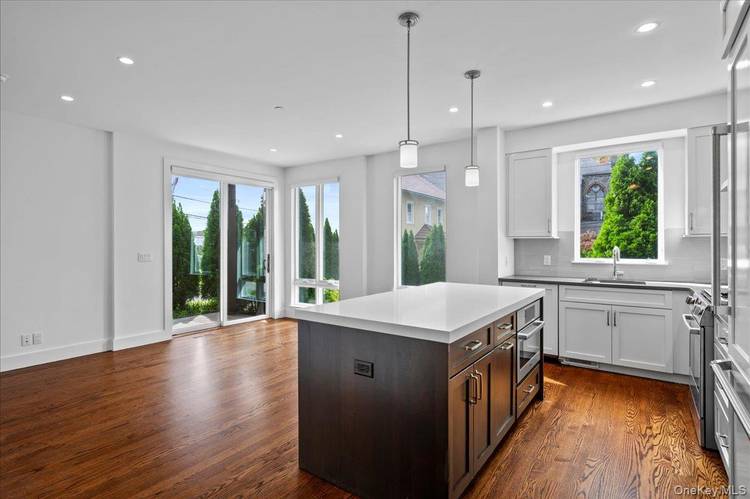 Sun filled 2 bedroom residence with bonus room featuring an open layout and high end finishes.