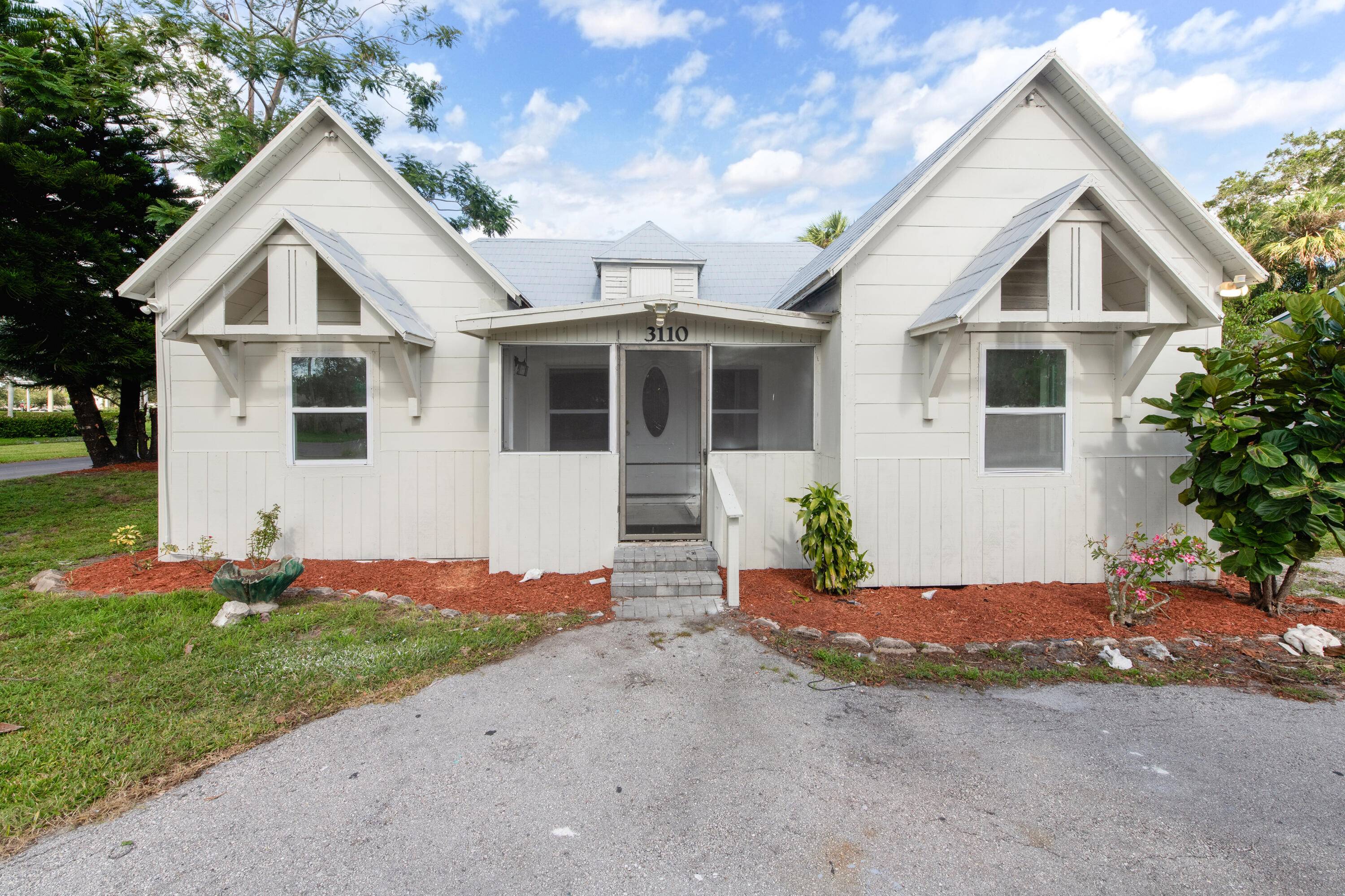At the heart of Fort Pierce, situated on corner lot access from both roads with plenty of outdoor space for future projects.
