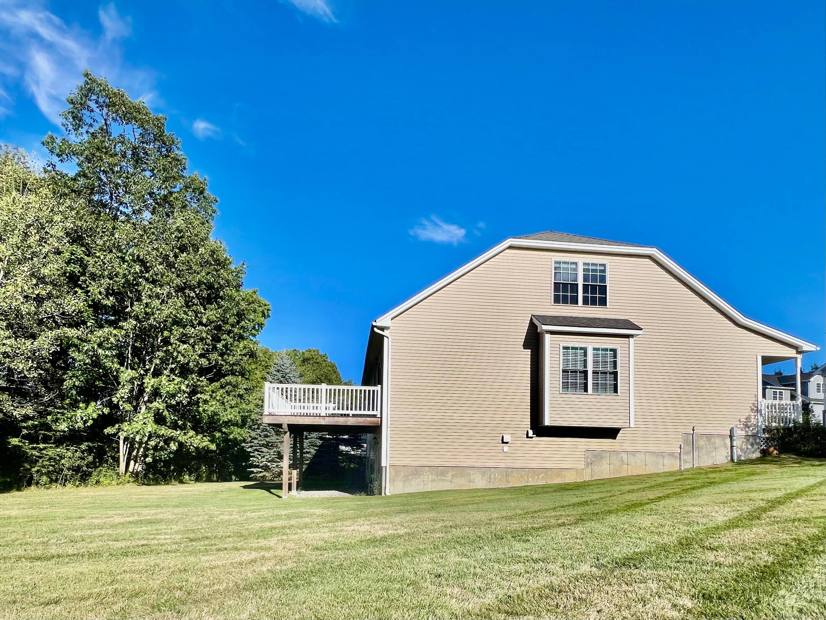 Welcome to 65 Oak Meadow Lane, located in one of Torrington's most sought after 55 communities !