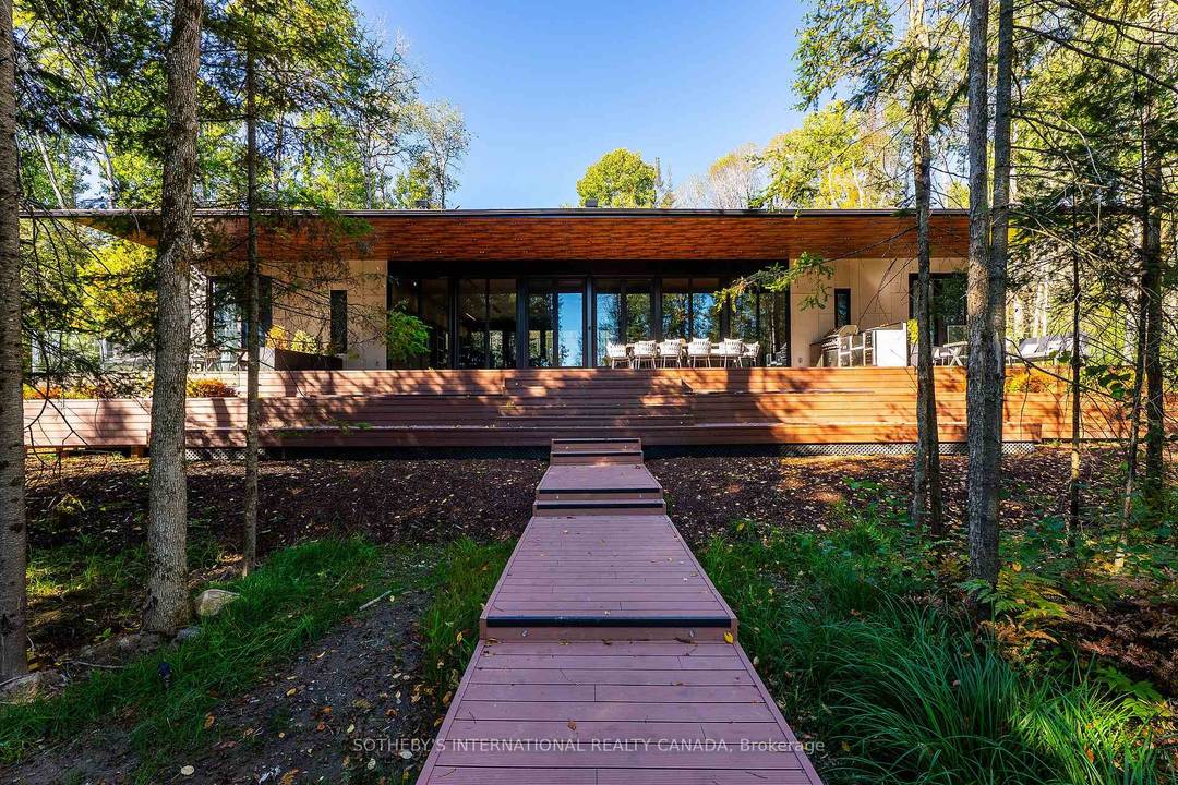 Discover your own private waterfront sanctuary in the desirable Burk's falls area on secluded Jack Lake with this Modern 8 bedroom, 6 bathroom lakefront estate offering on a 6 acres ...