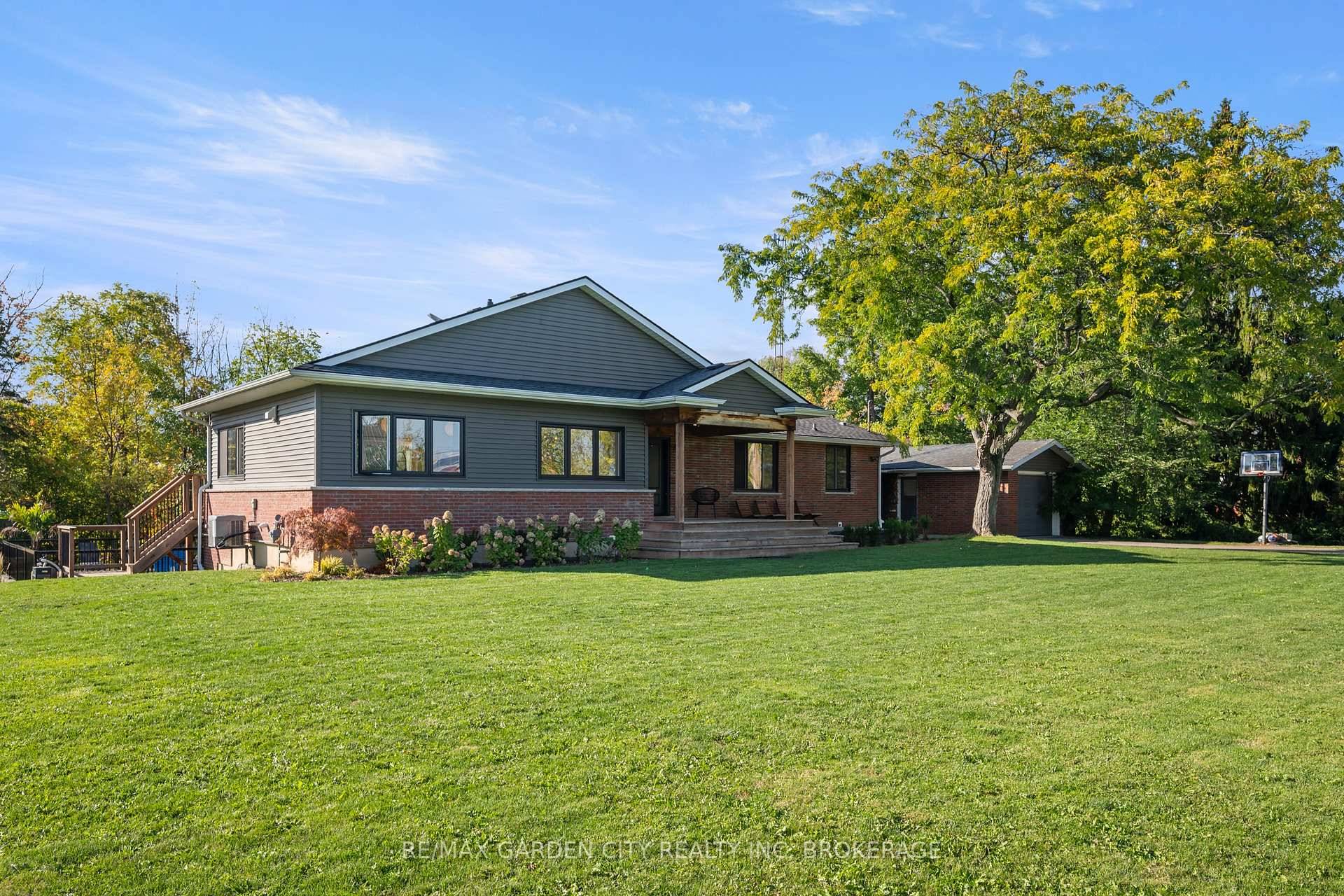 Welcome to this gorgeous Jordan home where prime location, picturesque ravine views a stunning walkout bungalow, peaceful country living, and gorgeous outdoor oasis meet !