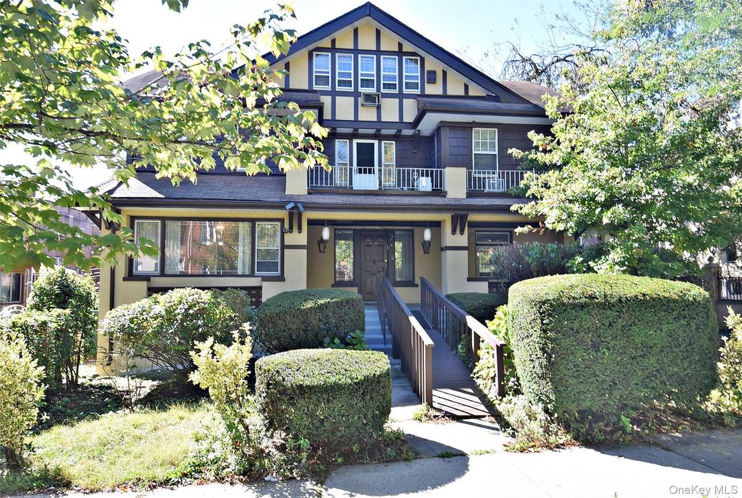 Welcome to this one of a kind Tudor home nestled on an impressive 75 x 125 lot.