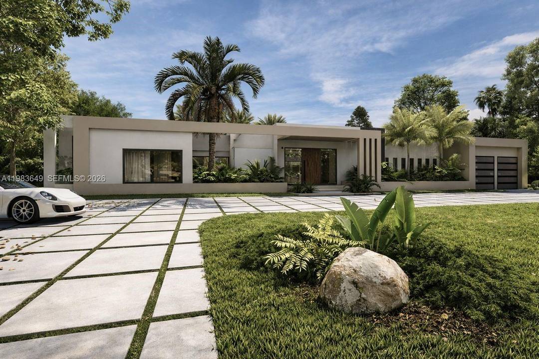 Striking brand new construction contemporary residence designed around a spectacular private courtyard pool with fountains and lush tropical landscaping, creating seamless indoor outdoor living.