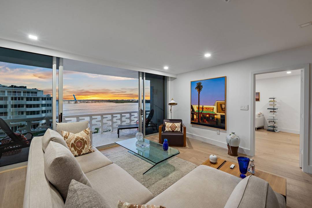 Enjoy breathtaking views and sunsets overlooking the Intracoastal in this meticulously renovated 2 bedroom, 2 bath penthouse, designed for elegance and comfort.