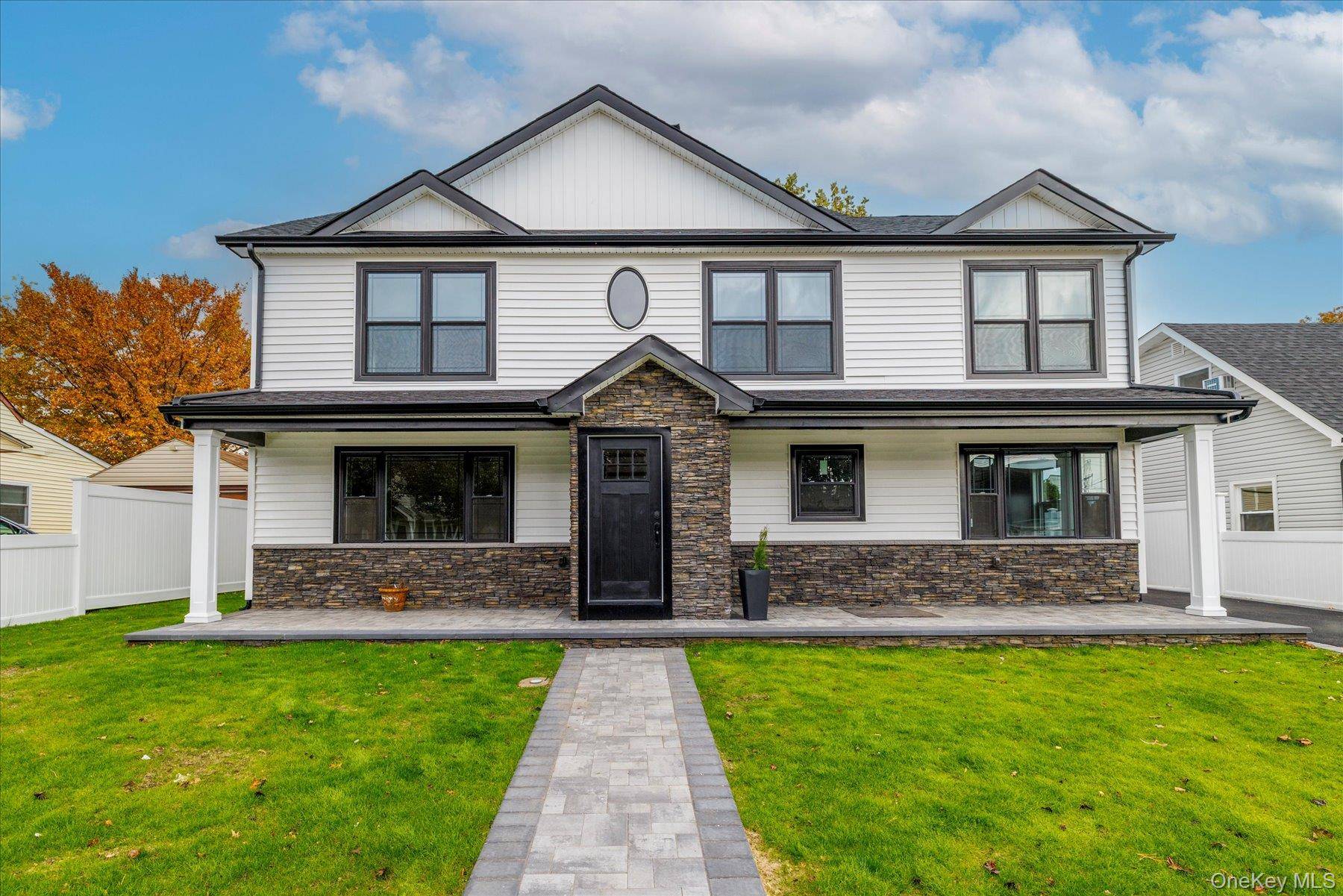 Welcome to this beautiful newly re constructed colonial in Levittown.